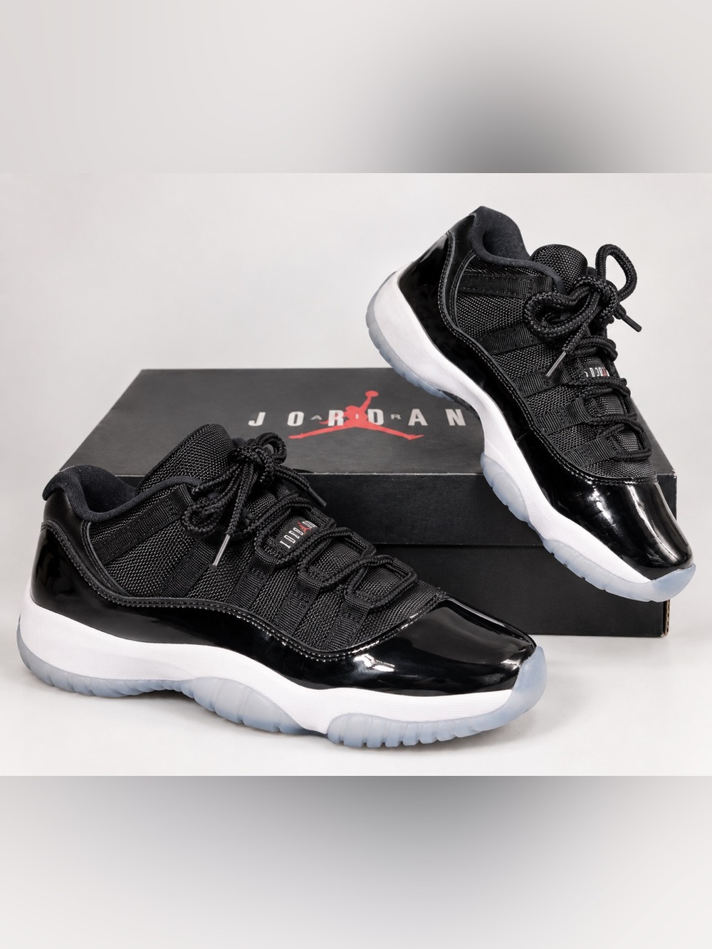 Jordan Kids Black and White Patent Low-Top Sneakers